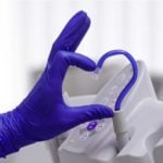 Dental Professional Wearing Trufit Violet Ultra Thin Nitrile Gloves